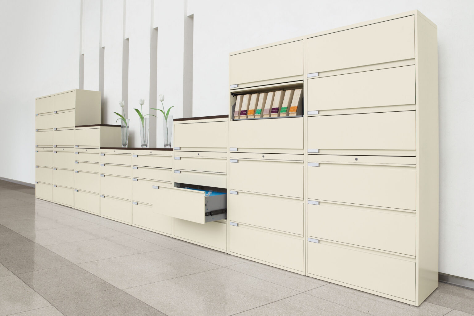 Wall of lateral filing cabinets in a modern office